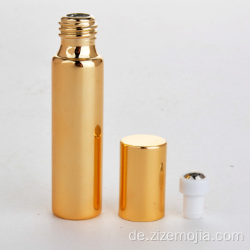 Gold-UV-Glasrolle mit ätherischem Öl auf Flasche